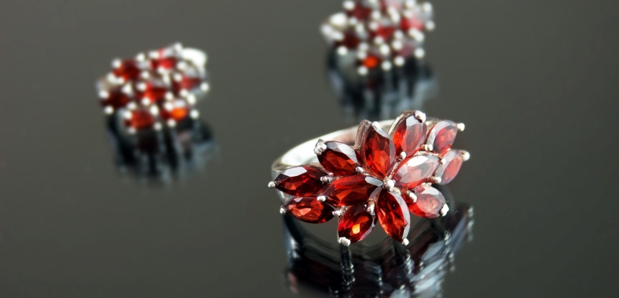 Three garnet rings