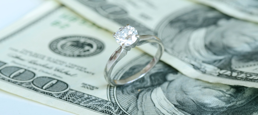 Picture of a ring on 100 dollar bills