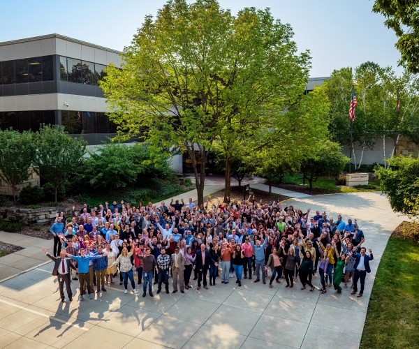 Picture of employees outside posing