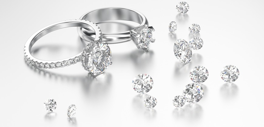 Two rings surrounded by diamonds