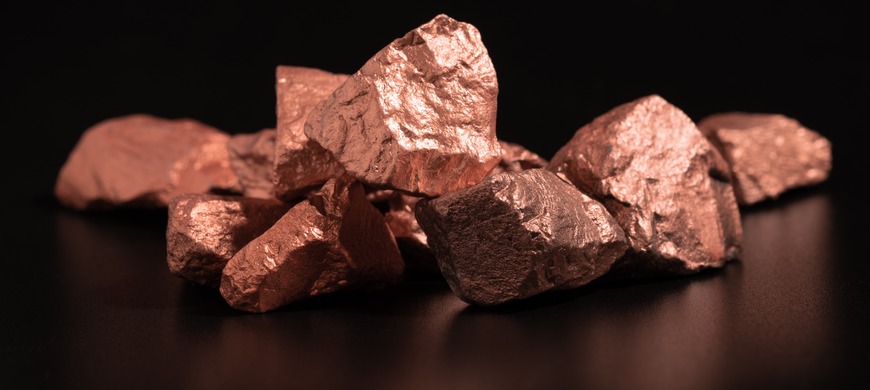Picture of copper stones on a black background