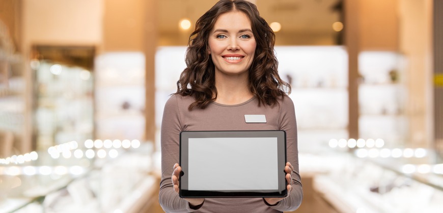 Woman holding a tablet in a jewelry store