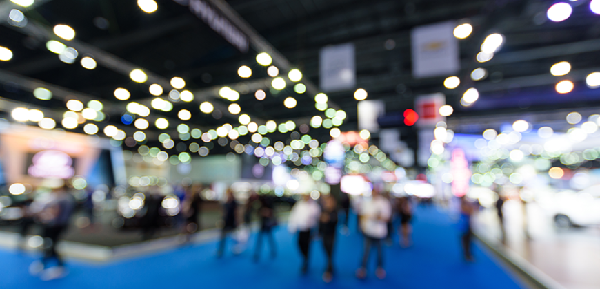 Blurred picture of people walking at a tradeshow