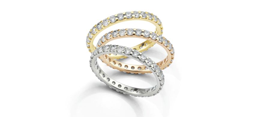 Gold, rose gold, and silver eternity ring