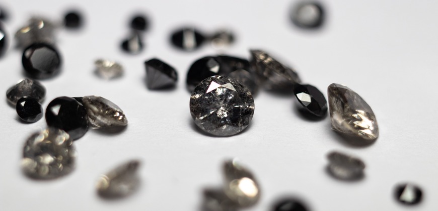 Salt and pepper diamonds on a white background