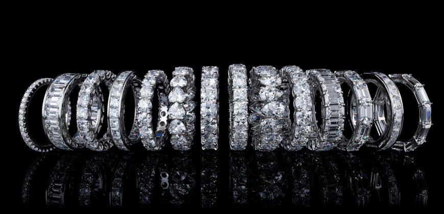 Different types of eternity rings on a black background