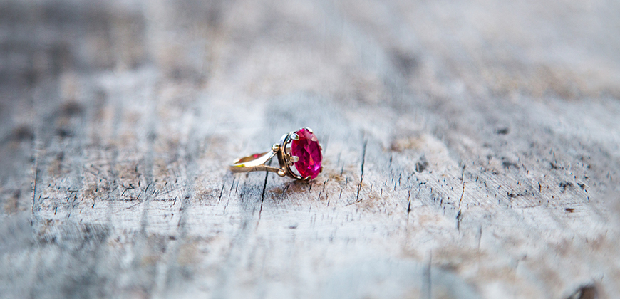 Ruby ring on a wood background