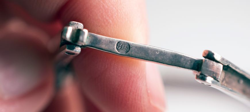 950 stamp on a silver bracelet