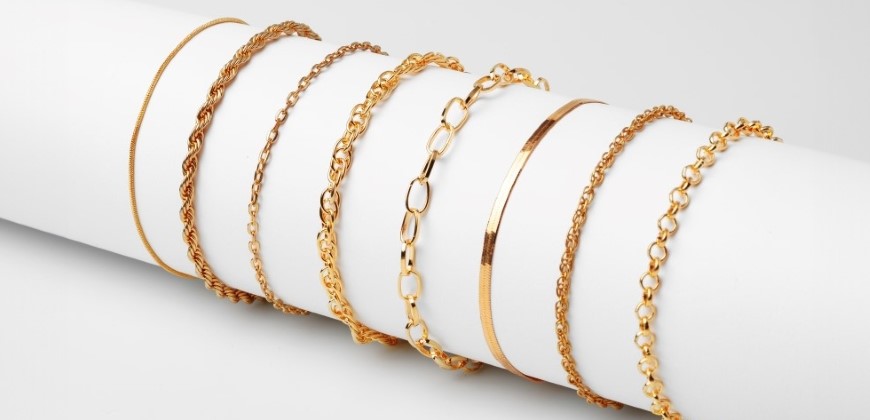 Gold bracelets on a holder