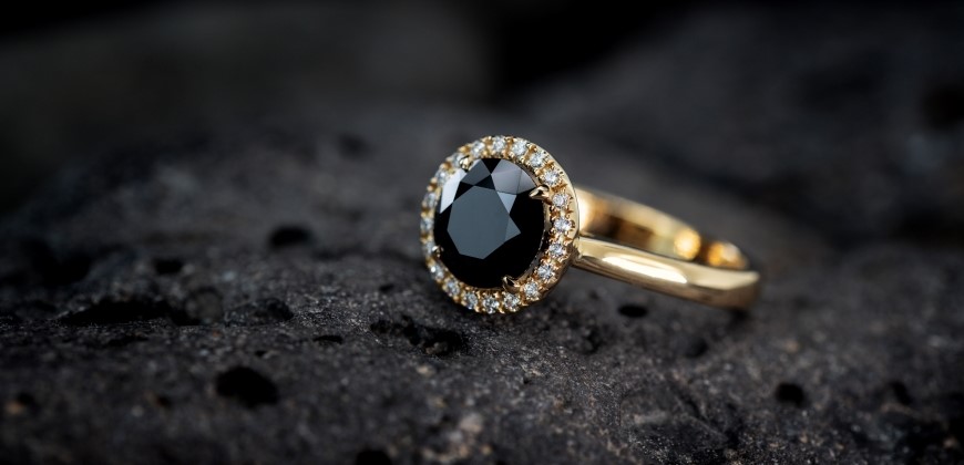 Black diamond and gold engagement ring