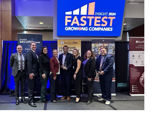 JM leaders with the fastest growing company award