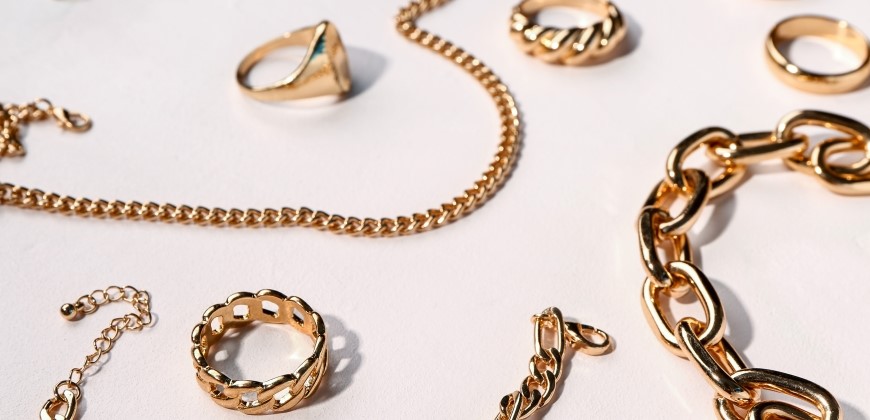 Gold jewelry on a white background