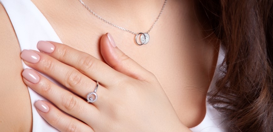 Woman with silver ring and necklace