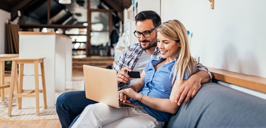 Couple shopping on a computer