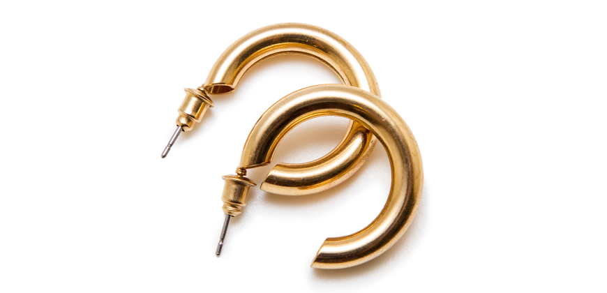 Two chunky gold hoop earrings
