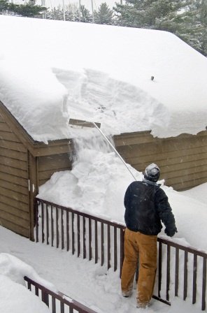 Using a roof rake