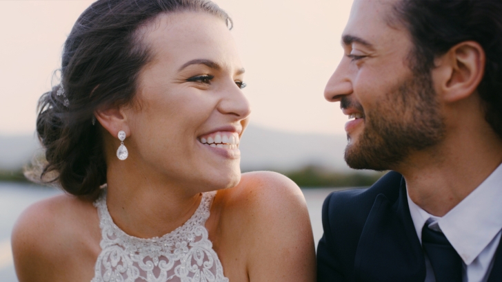 Couple smiling at each other wedding day