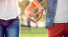 Holding hands to create heart