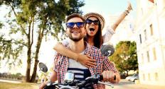 couple wearing jewelry safely on moped feature