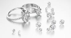 Two rings surrounded by diamonds