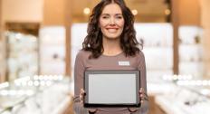 Woman holding a tablet in a jewelry store
