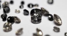 Salt and pepper diamonds on a white background
