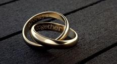 Always engraved on one ring and together engraved on another ring, intertwined