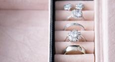 Engagement ring with other rings in a jewelry box
