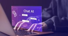 Hologram of a chat AI above a laptop
