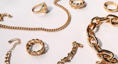 Gold jewelry on a white background