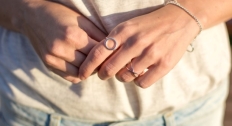 Hands with silver rings and a bracelet on