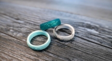 Three silicone rings on a wood background