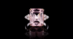 Morganite ring on a reflective black background