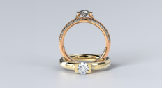 A rose gold and yellow gold ring together