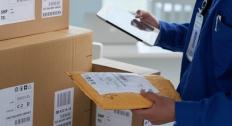 Holding a padded envelope