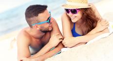 Couple lying on beach