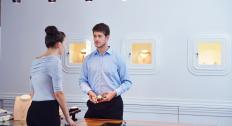 business man selling in jewelry store