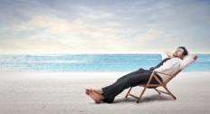 man on beach chair in work clothes